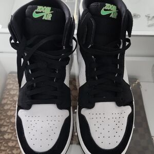 Jordan Black and White Sneakers with Green Accents